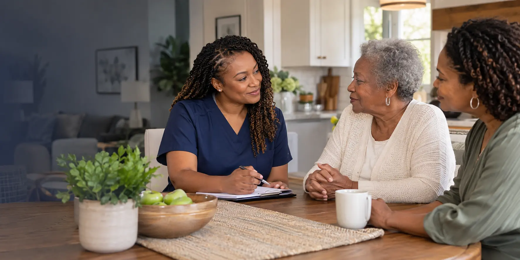 ELIM'S GATE care coordinator discussing home-care needs with an older adult and her family